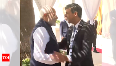 G7 Summit: PM Modi and British PM Rishi Sunak meet in Italy to discuss bilateral relations | India News - Times of India