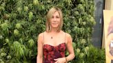 Jennifer Aniston Is Radiant in a Red Floral Gown and Crimson Accessories