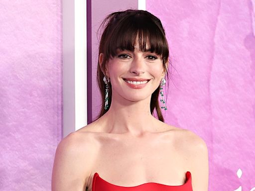 Anne Hathaway, Son Handed Out Snacks to Taylor Swift Fans in Germany