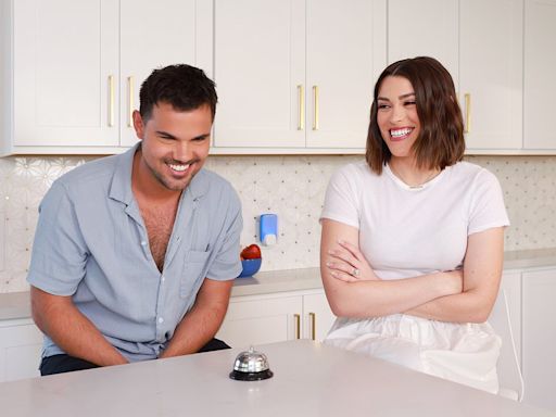 Taylor Lautner and wife Tay Lautner poses in matching white