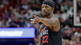 Miami Heat forward Jimmy Butler gestures during a game against the Denver Nuggets at Kaseya Center on March 13, 2024, in Miami.