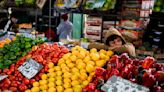 Argentina reports its first single-digit inflation in 6 months as markets swoon and costs hit home