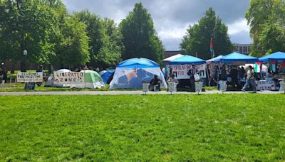 Protestors set up camp outside Knight Library on U of O campus