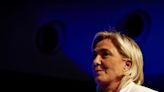 France's Le Pen expects clear far-right win and power over Macron