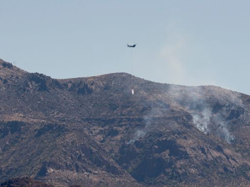 Super scooper planes boost containment efforts in Siphon Fire