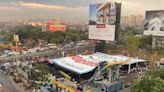 A massive billboard fell onto a petrol station and killed at least 14 people during a freak storm