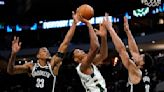 Irving, Durant lead Nets past winless Bucks 107-97