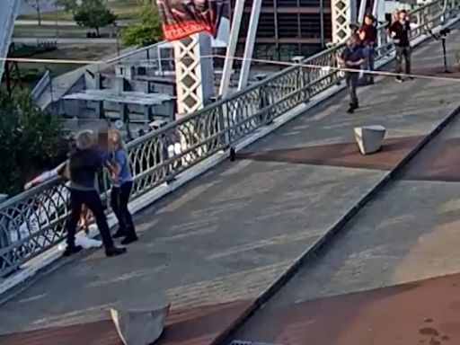 Video shows Jon Bon Jovi save a woman who was about to jump off a bridge, hug her