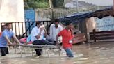 Video: With Road Flooded, Medical College Principal Taken Out On A Stretcher