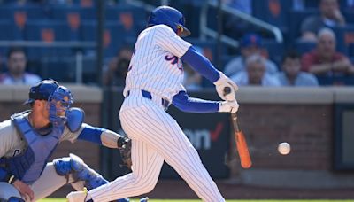 Francisco Lindor shakes off illness, comes off bench to rally Mets past Cubs 7-6 in 11 innings