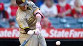 ... Padres hits an RBI single against the Los Angeles Angels in the third inning at Angel Stadium of Anaheim on Tuesday, June 4, 2024, in Anaheim, California...