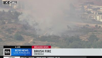 Crews battling brush fire burning near 210 Freeway in Tujunga