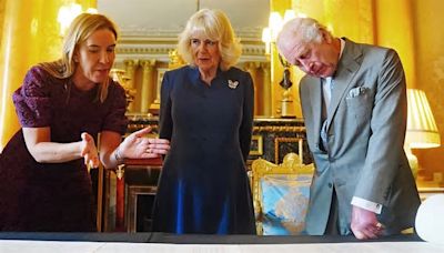 King Charles and Queen Camilla receive their Coronation Roll - almost a year since they were crowned at Westminster Abbey