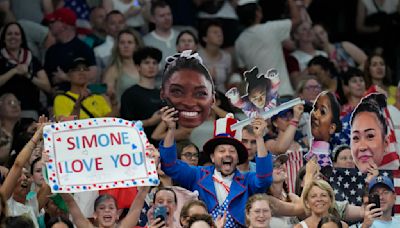 AP PHOTOS: Fans are making big deal out of their favorite Olympians with large, easy-to-see cutouts