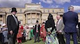 King and Queen greet guests at Creative Industries Garden Party