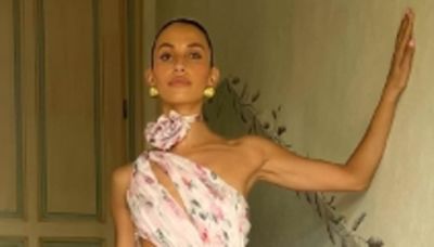 Influencer wears a VERY dramatic gown to her brother's wedding