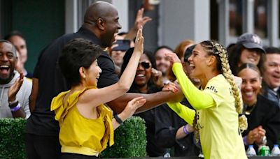 WATCH: Washington Spirit, USWNT star Trinity Rodman does 'slam dunk' celebration in front of Magic Johnson