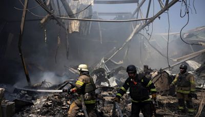 At least seven killed in Russian strike on Kharkiv as Zelensky pleads for more weapons
