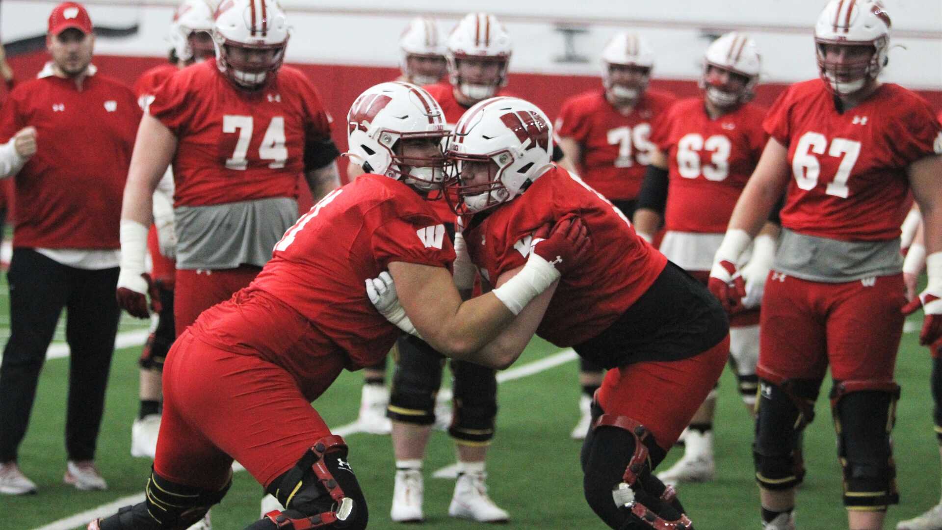 Wisconsin tries to regain supremacy in the trenches under its 4th O-line coach in as many years