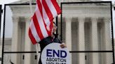 ‘God bless Justice Alito’: Conservatives rejoice as Supreme Court strikes down Roe