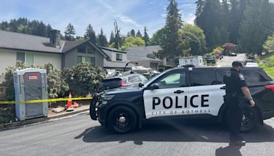 Former Bothell council member's home searched as murder charge is filed in court