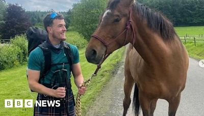 Scotland fan walking to Euros passes halfway mark