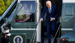 Pictured: Joe Biden ‘uses team of walkers to hide shuffling gait’ to Marine One