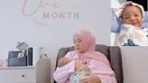 Shila Amzah reveals baby's face to the public for the first time