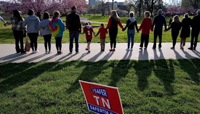 Activists form human chain across Nashville, Tennessee, on Covenant school shooting anniversary