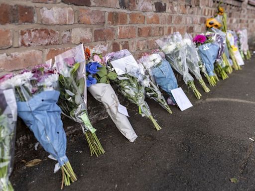 UK police quiz teenage suspect over attack that left 2 children dead and several critically hurt