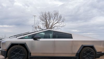 Camping in the Tesla Cybertruck sure seems overly complicated compared to a plain old rooftop tent on a Rivian R1T