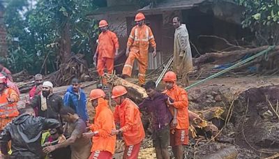 Man attempts to survive in landslide-hit Wayanad hamlet by clinging to boulder in gushing flood water