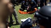 Dozens more arrested at UT-Austin as police use pepper spray, flash bangs to break up protests