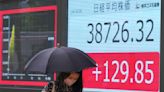 Stock market today: Asian shares lower after Wall Street closes another winning week