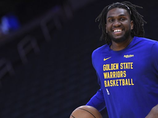 Warriors GM explains decision to guarantee Looney's contract