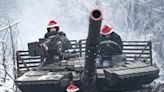 Photos show Ukrainians celebrating wartime Christmas after switching to December 25 to snub Russia