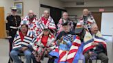 Perry Piecemakers present Quilts of Valor to nine veterans