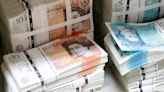 Sterling bows to dollar strength after UK GDP data