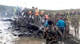 Plane crash kills 18 as aircraft slips off runway while attempting take-off at Nepal airport