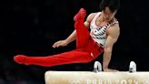 Gymnastics-Bathwater mishap forces Japan's Oka to swap cardboard bed