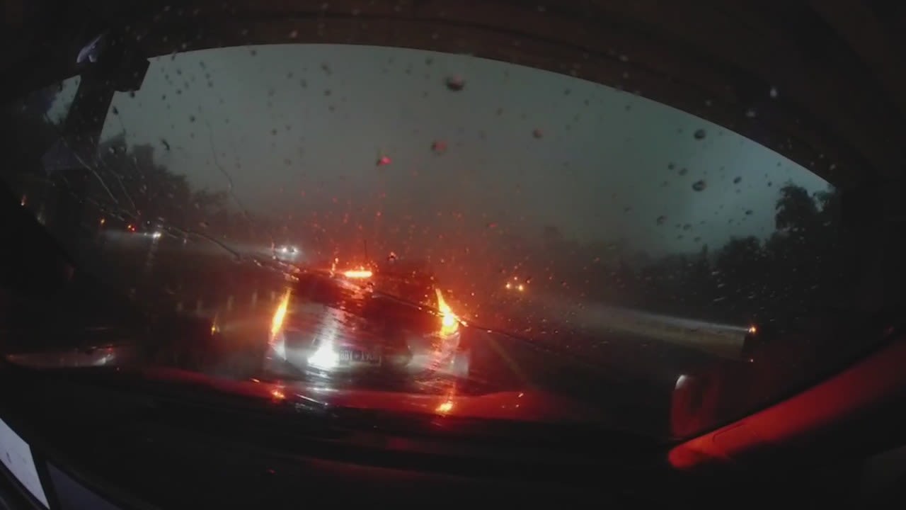 Woman caught along interstate as storm passes