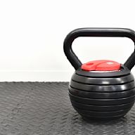 Kettlebells with adjustable weight plates. Great for those who want to increase their weight lifting ability without purchasing multiple kettlebells.