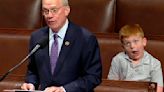 Congressman's son steals the show making silly faces behind dad during speech on the House floor