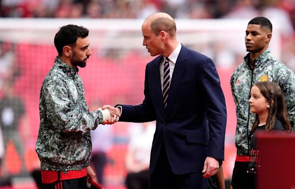 Royal news – live: Prince William attends FA Cup Final as Harry and Meghan portrait finds new home