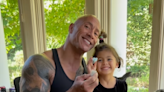 Dwayne Johnson shares grateful post with daughter Tiana, 4, in his lap: 'Thanks for being so nice to your T-Rex daddy'