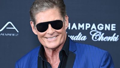 Baywatch legend David Hasselhoff proudly reveals he's a grandad as he emotionally cradles newborn