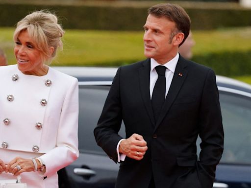French First Lady Brigitte Macron Suits Up in Louis Vuitton Cropped Jacket and Skirt at Olympics Kickoff Gala in Paris