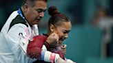 Gymnast refuses to quit Olympics with torn ligament; ends routine crying in pain