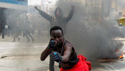 Tear gas, stones and flames as Kenya protesters say 'Ruto must go!'