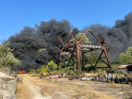 Dark smoke billows on Ross Island due to large fire in abandoned structure